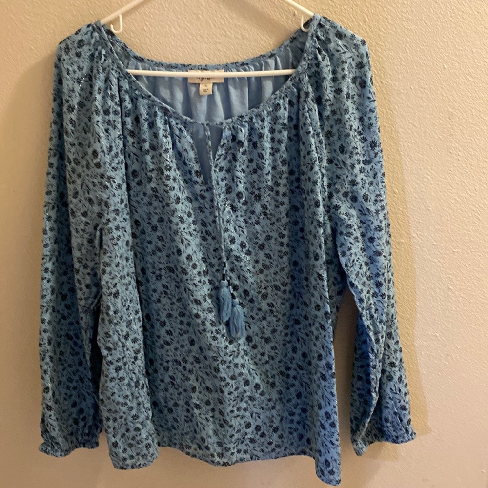 Woman’s cotton blouse, made in India.light blue with navy blue little flowers .